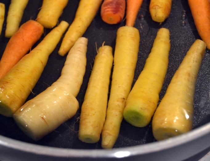 Carrots simmering in a pan